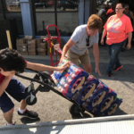 We quickly learned that our mission and our ambitious goals involved a LOT of heavy lifting and moving (4000 pounds of sports drinks from the Boy Scout Jamboree via the Mountaineer Food Bank)